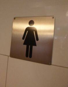hey the restroom ladies have two legs here!